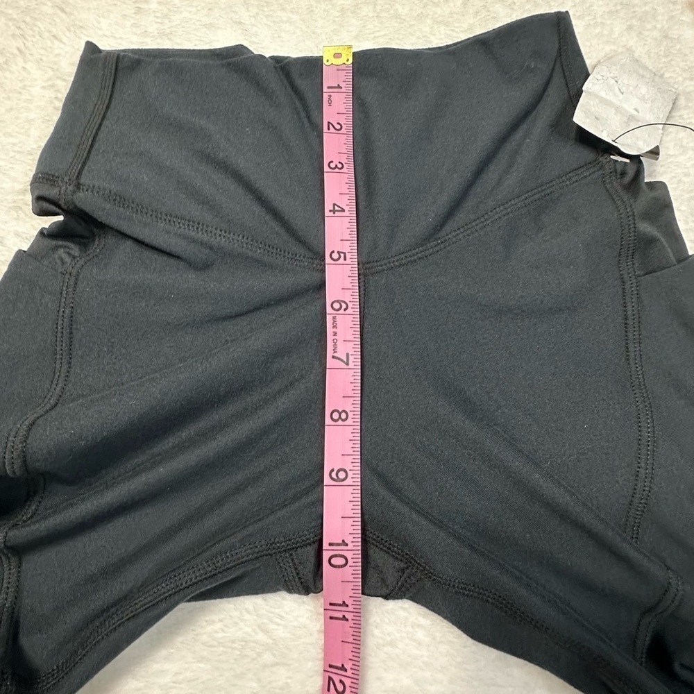 UFC Women's Black Bike Shorts with Red Logo and Side Pockets - Picture 9 of 12